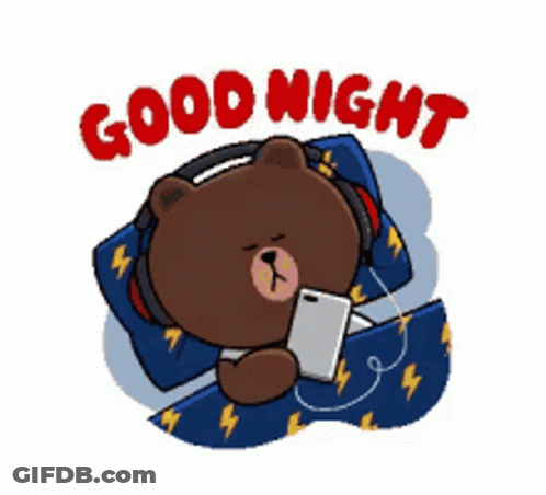 A Brown Bear Wearing Headphones Is Laying In Bed With A Cell Phone And Says Good Night . GIF