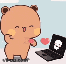 A Brown Teddy Bear Is Standing Next To A Laptop Computer . GIF