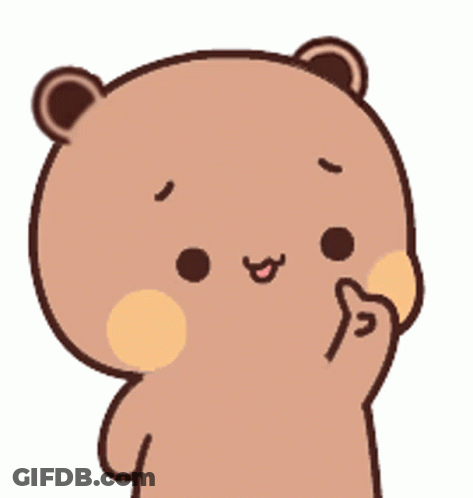 A Brown Teddy Bear With A Yellow Circle On Its Cheek Is Smiling And Holding Up Its Finger . GIF