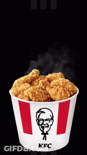 A Bucket Of Fried Chicken From Kfc With A Black Background GIF