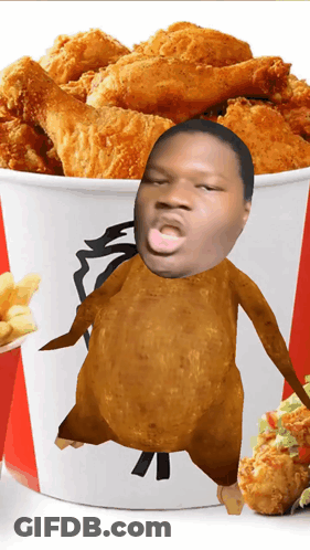 A Bucket Of Fried Chicken With A Man 'S Face In It GIF