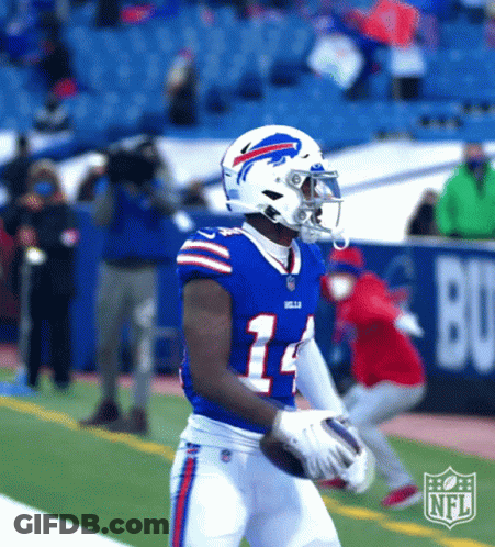 A Buffalo Bills Football Player Is Holding A Football GIF