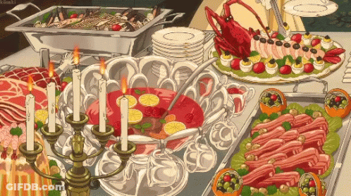 A Buffet Table With A Lot Of Food And Candles On It GIF