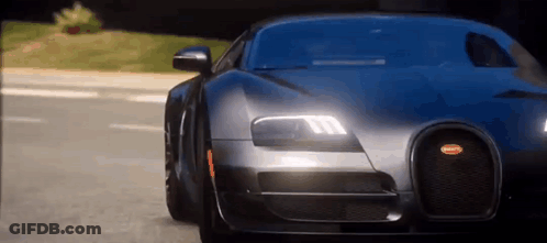 A Bugatti Veyron Is Driving Down A Street In A Video Game . GIF
