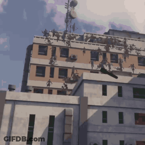 A Building With A Bunch Of People On It GIF