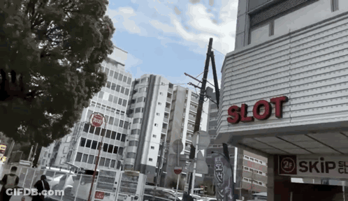 A Building With The Word Slot On The Side Of It GIF