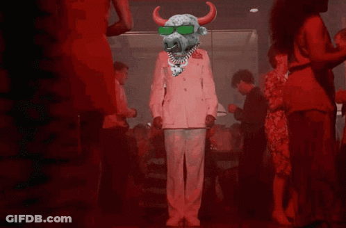 A Bull Wearing Sunglasses And A Necklace Is Dancing In A Crowd GIF