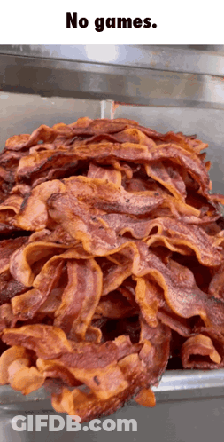 A Bunch Of Bacon Is Stacked On Top Of Each Other And Says No Games GIF