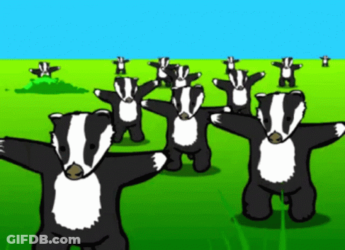 A Bunch Of Badgers Are Dancing In A Field GIF