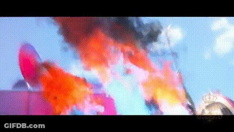 A Bunch Of Balloons Are Flying In The Air With A Blue Sky In The Background . GIF