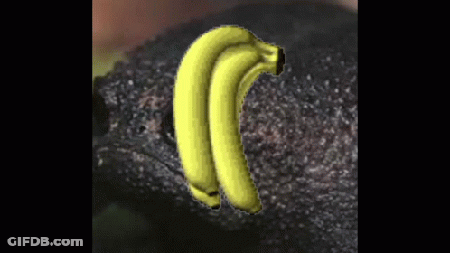 A Bunch Of Bananas Sitting On Top Of Each Other GIF