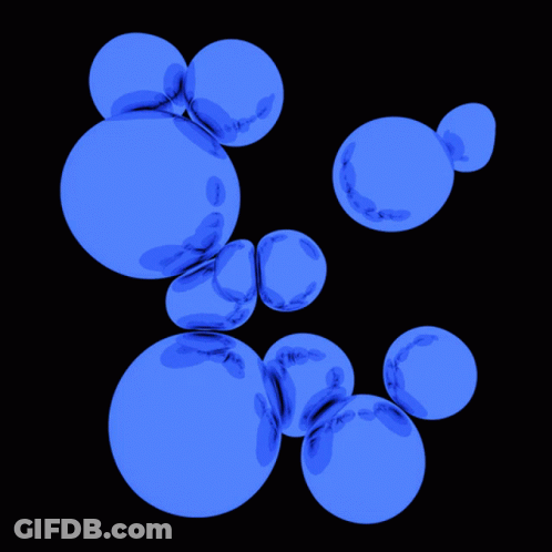 A Bunch Of Blue Bubbles Are Floating In The Air GIF