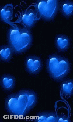 A Bunch Of Blue Hearts On A Black Background With The Website Reddo.com GIF