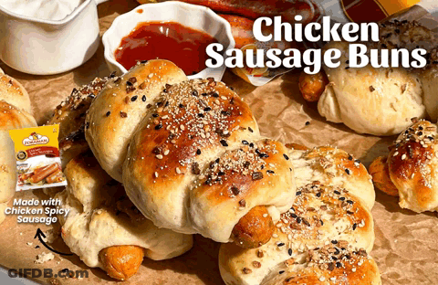 A Bunch Of Chicken Sausage Buns Are On A Table GIF