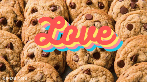 A Bunch Of Chocolate Chip Cookies With The Word Love On It GIF