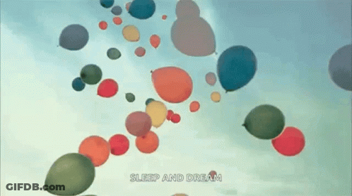 A Bunch Of Colorful Balloons Flying In The Sky With The Words Sleep And Dream Written Below Them GIF