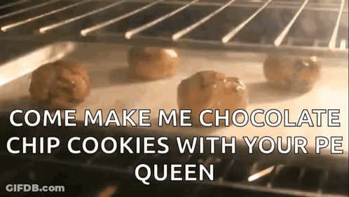A Bunch Of Cookies Are Sitting On A Baking Sheet In An Oven . GIF