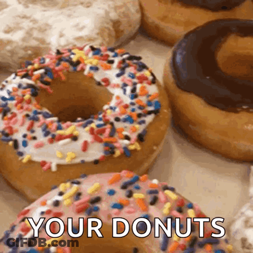 A Bunch Of Donuts With Sprinkles And The Words " Your Donuts " In The Corner GIF