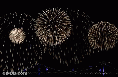 A Bunch Of Fireworks In The Night Sky GIF