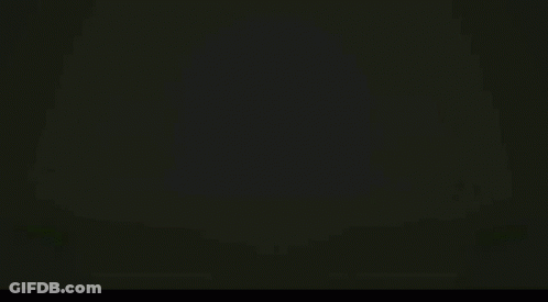 A Bunch Of Green Beans Are Falling On A Green Background . GIF