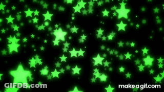 A Bunch Of Green Stars Are Floating In The Air On A Black Background GIF