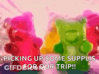 A Bunch Of Gummy Bears Are Sitting Next To Each Other With The Words `` Picking Up Some Supplies For Our Trip ! '' GIF