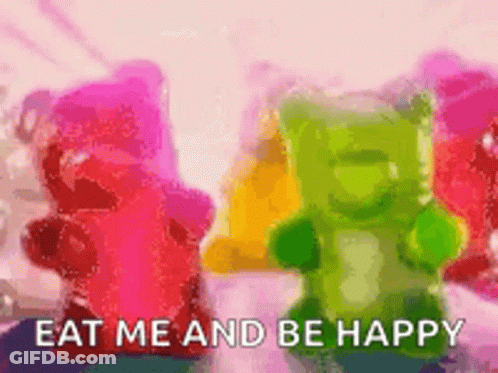 A Bunch Of Gummy Bears With The Words `` Eat Me And Be Happy '' GIF