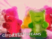 A Bunch Of Gummy Bears With The Words `` Sweet Dreams '' Written On Them GIF