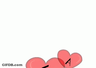 A Bunch Of Heart Shaped Balloons With The Letters T E A And M Written On Them GIF