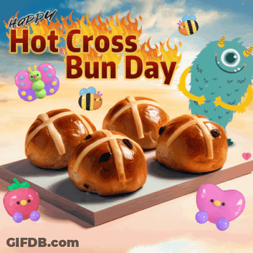 A Bunch Of Hot Cross Buns Sitting On A Table GIF