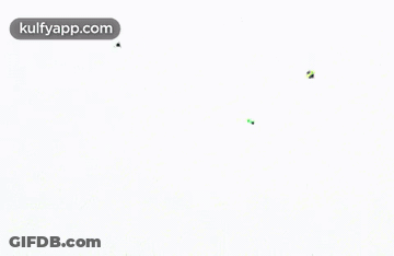 A Bunch Of Kites Are Flying On A White Background GIF