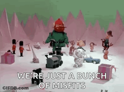 A Bunch Of Misfits Are Standing In The Snow . GIF