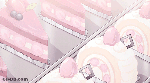 A Bunch Of Pink And White Cakes On Display GIF