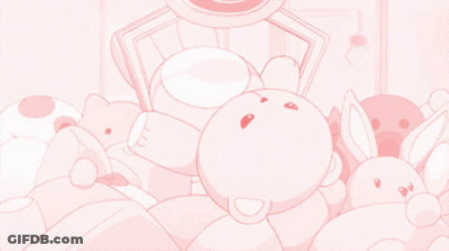 A Bunch Of Pink Stuffed Animals Are Laying On A Pink Surface GIF
