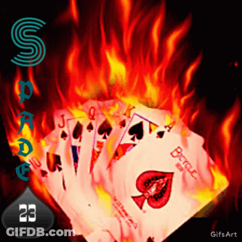 A Bunch Of Playing Cards Are On Fire With The Number 23 On The Bottom GIF