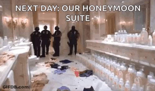 A Bunch Of Police Officers Are Standing In A Messy Bathroom Next To A Row Of Bottles . GIF