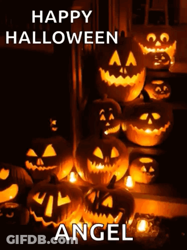 A Bunch Of Pumpkins With Faces Carved Into Them And The Words Happy Halloween Angel Above Them GIF