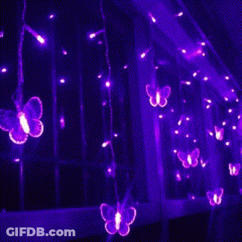 A Bunch Of Purple Lights With The Words `` Goodbye '' Written On It . GIF