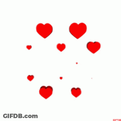 A Bunch Of Red Hearts Are Floating In The Air GIF