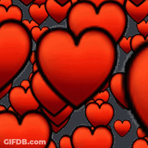 A Bunch Of Red Hearts On A Dark Background GIF