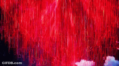 A Bunch Of Red Lights Are Coming Out Of The Sky GIF