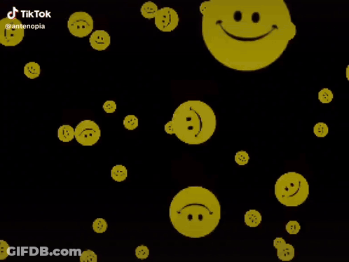 A Bunch Of Smiley Faces Are Floating In The Air On A White Background GIF