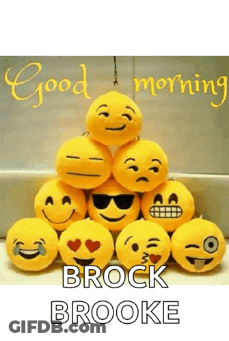 A Bunch Of Stuffed Smiley Faces Are Stacked On Top Of Each Other With The Words `` Good Morning Brock Brooke '' GIF