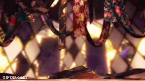 A Bunch Of Ties Are Hanging On A Shelf In A Room . GIF