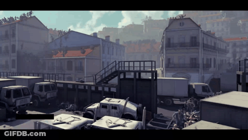 A Bunch Of Vehicles Are Parked In Front Of A Building With A Staircase GIF