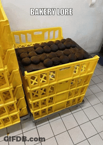 A Bunch Of Yellow Crates With The Words Bakery Lore On The Bottom GIF
