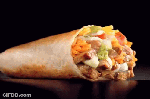 A Burrito With Meat And Vegetables On A Black Background GIF