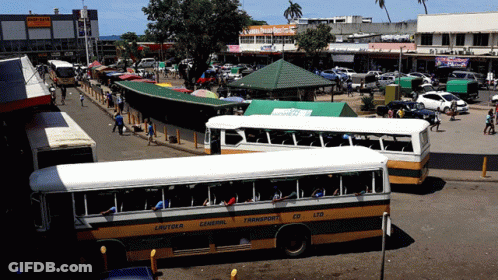 A Bus That Says General Transport Ltd On It GIF
