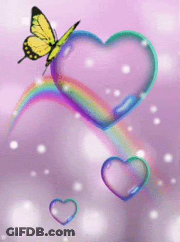 A Butterfly Sits On A Heart Shaped Soap Bubble GIF