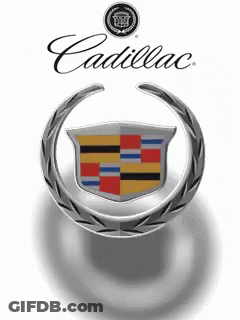 A Cadillac Logo With A Wreath Around It On A White Background GIF